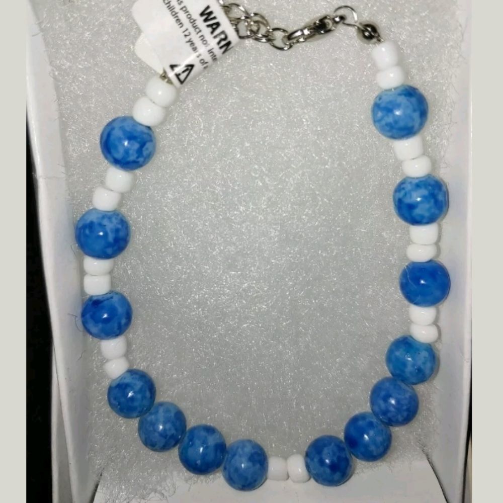 Handmade 7" bracelet with Glass Blue Beads and white seed spacers